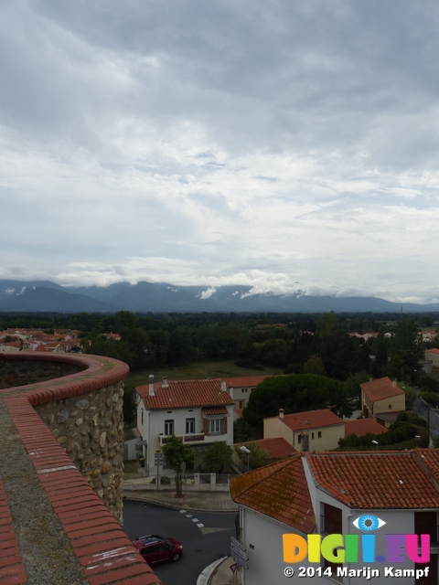 FZ007520 Roofs and clouds over mountain